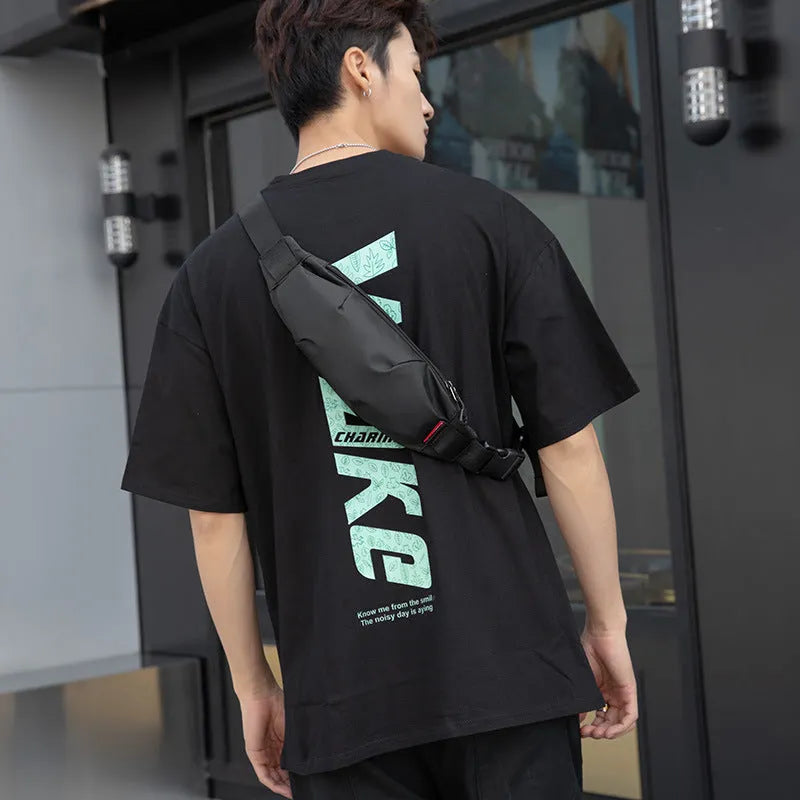 Black Oxford cloth crossbody waist pack with multiple internal pockets showing dimensions