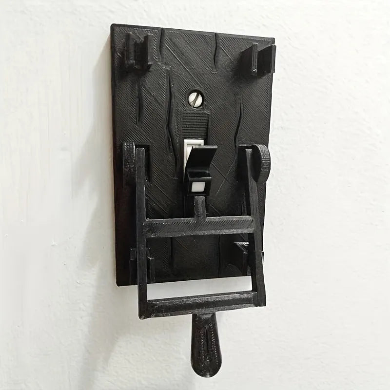 Retro-style mechanical light switch with a decorated plate for exposed wall installation.
