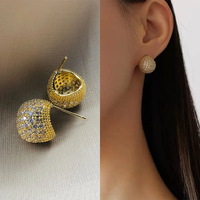 Little Golden Beans geometric drop earrings with spherical elements and diamond detailing in gold and white colours