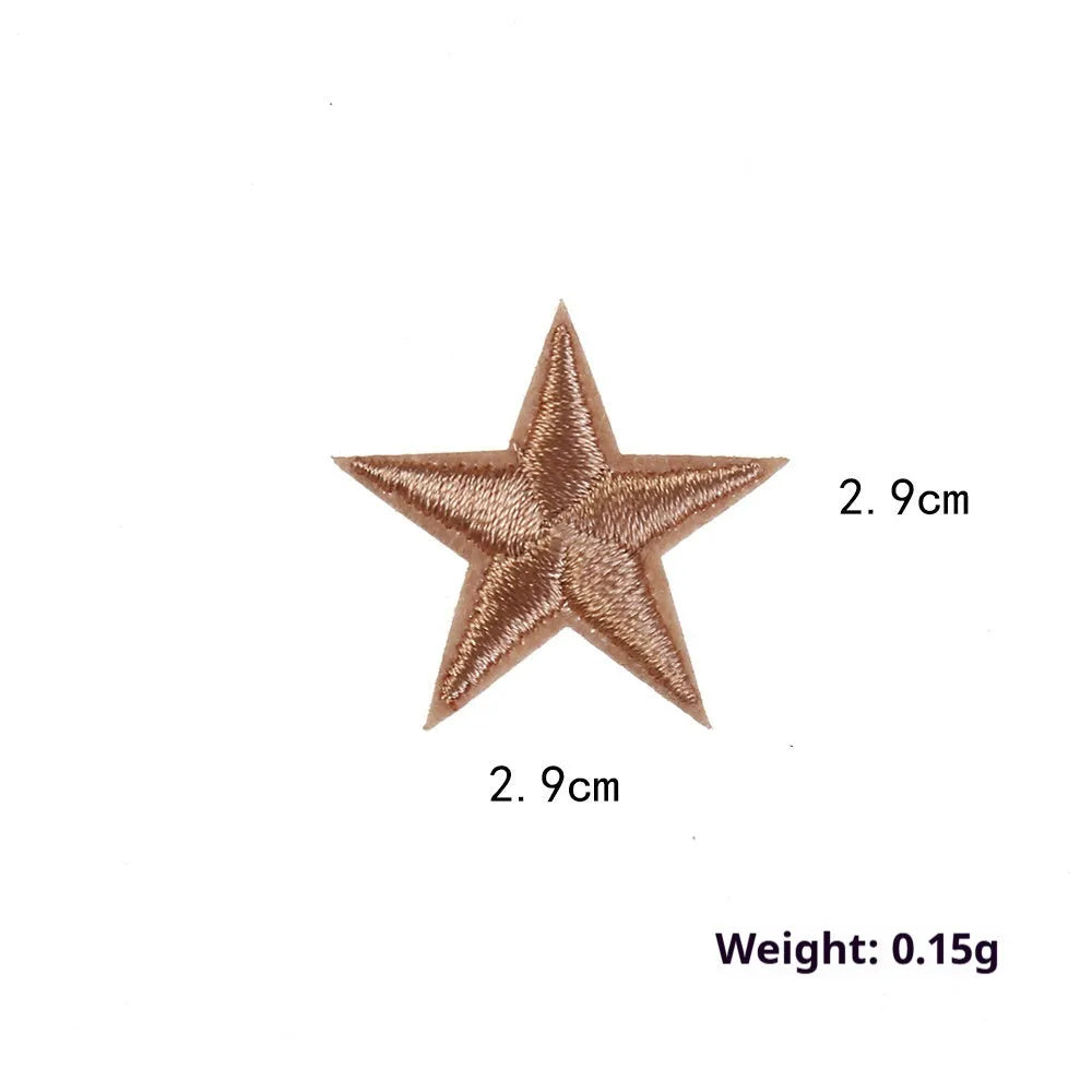 Colourful embroidered five-pointed star designs on cloth sticker labels for DIY clothing customisation.