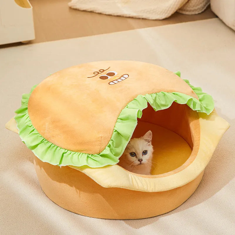 Medium-sized grey cat kennel with a removable roof panel and a soft beige cushion inside.