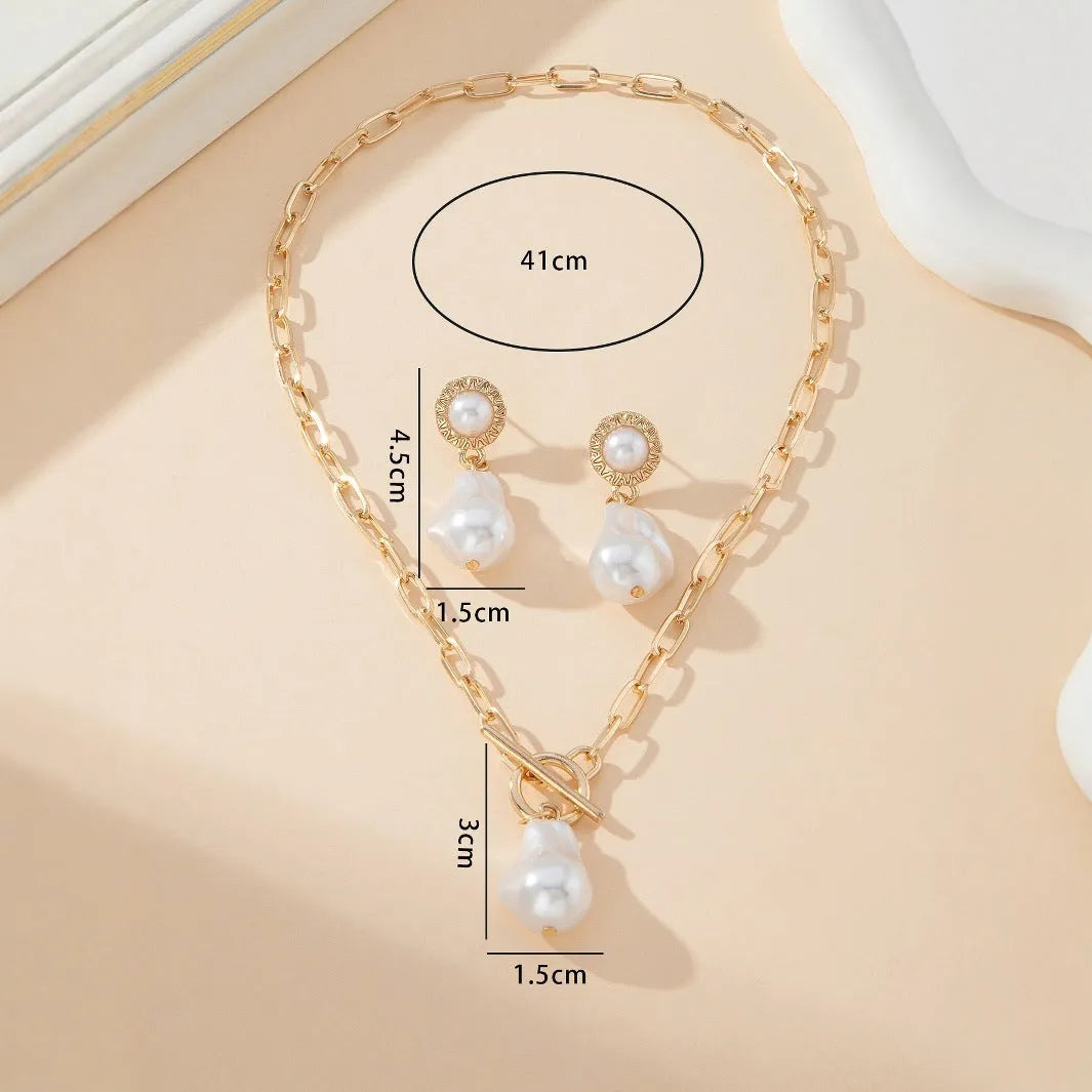 Gold coloured retro baroque pearl pendant necklace and matching ear stud jewellery set