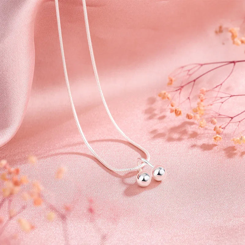 Silver cherry necklace on adjustable snake bone chain with S925 silver construction