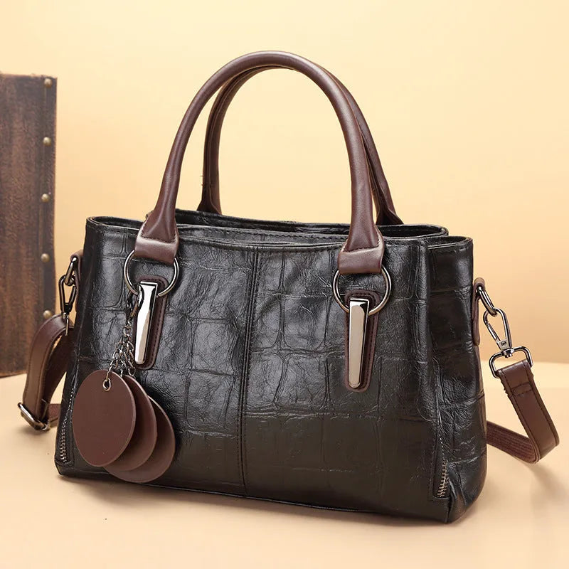 Large capacity shoulder bag in vintage brown with horizontal square design and multiple internal compartments