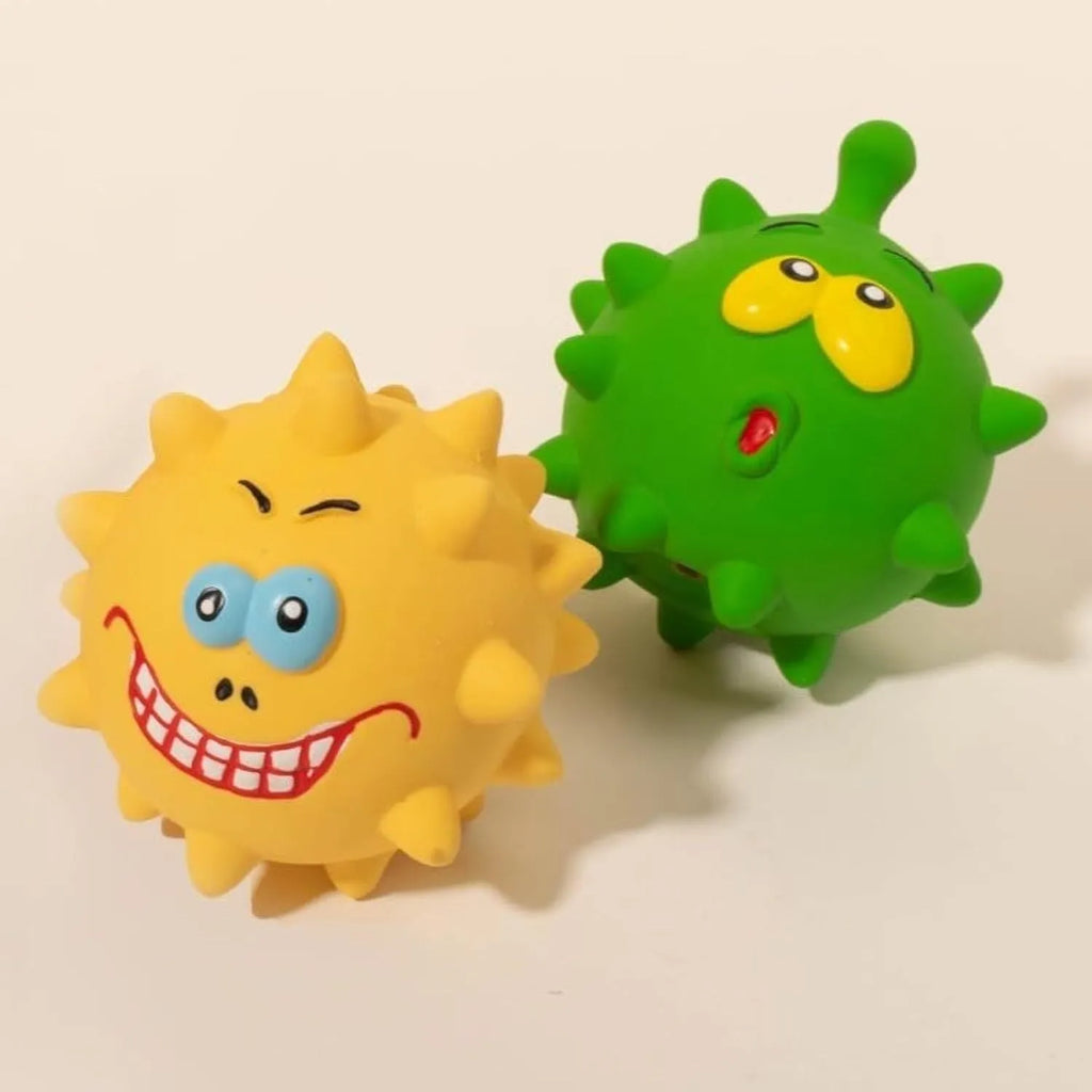 Four coloured natural latex squeaky dog balls with cute faces, each measuring 7.5cm