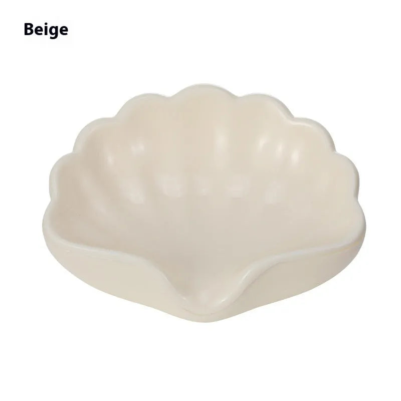 Plastic shell-shaped soap dish in pearl white colour with drainage design for bathroom use