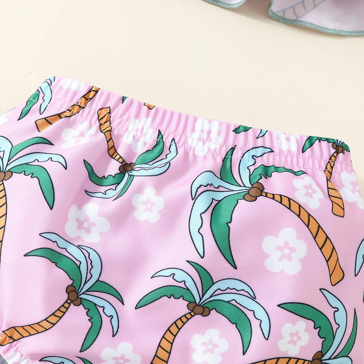 White children's swimsuit two-piece set with sleeveless top and shorts
