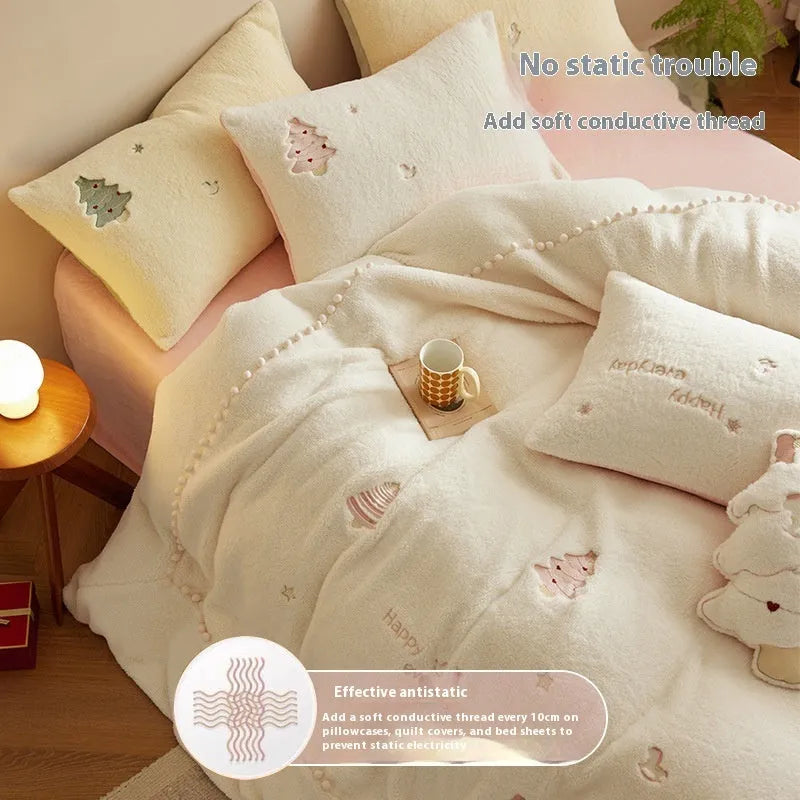 Winter milk fibre four-piece bedding set with green Christmas tree pattern on bed