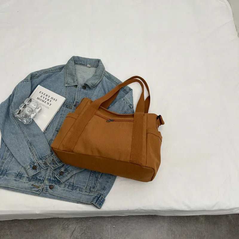 Large capacity polyester shoulder bag for women with internal mobile phone pocket