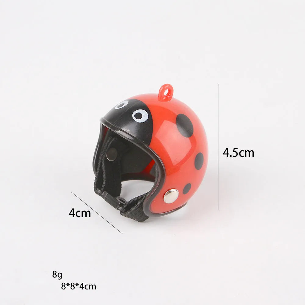 Small hard plastic pet helmet with elastic adjustment straps and sponge lining for chickens and birds