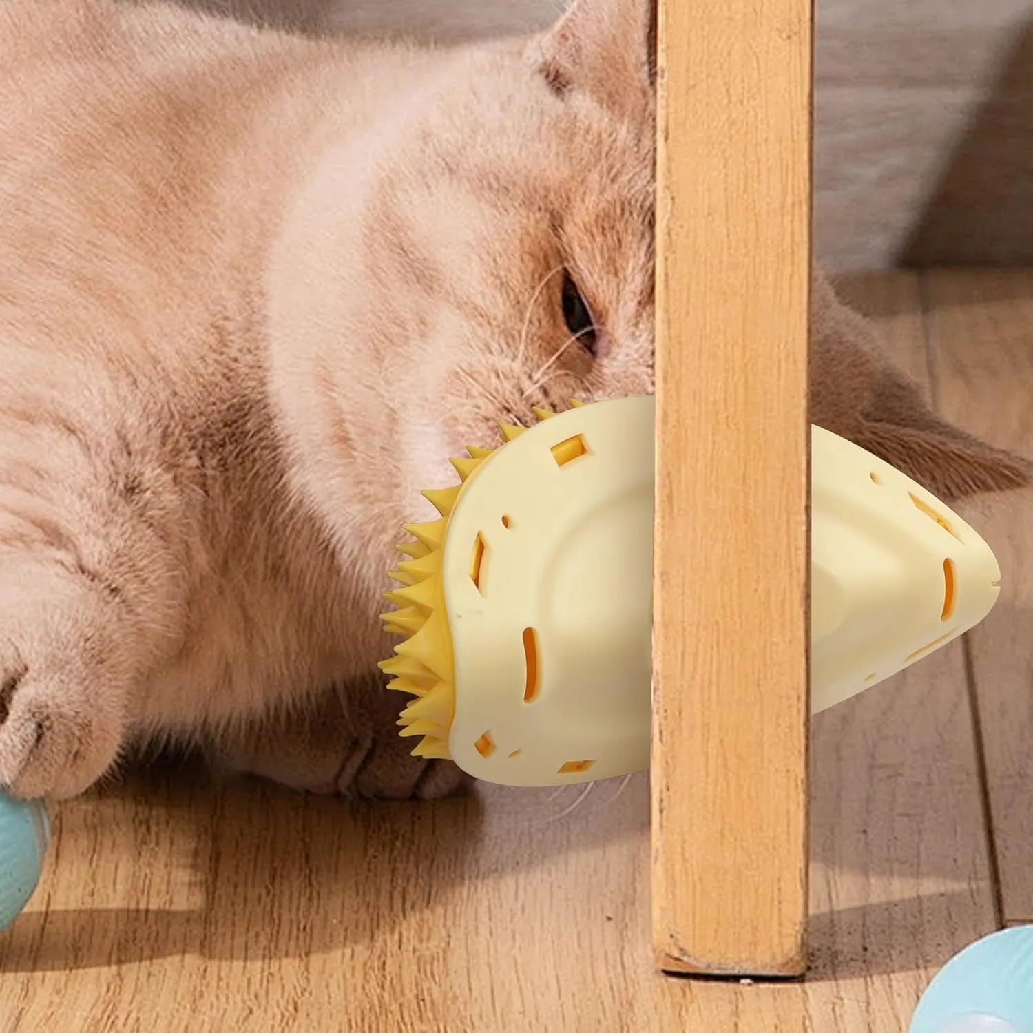 Yellow durian-shaped cat corner scratcher with massage comb for wall mounting