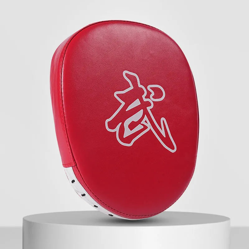 A pair of PU punch mitts for boxing and Muay Thai training, shown in a red edge and black surface colour variant.