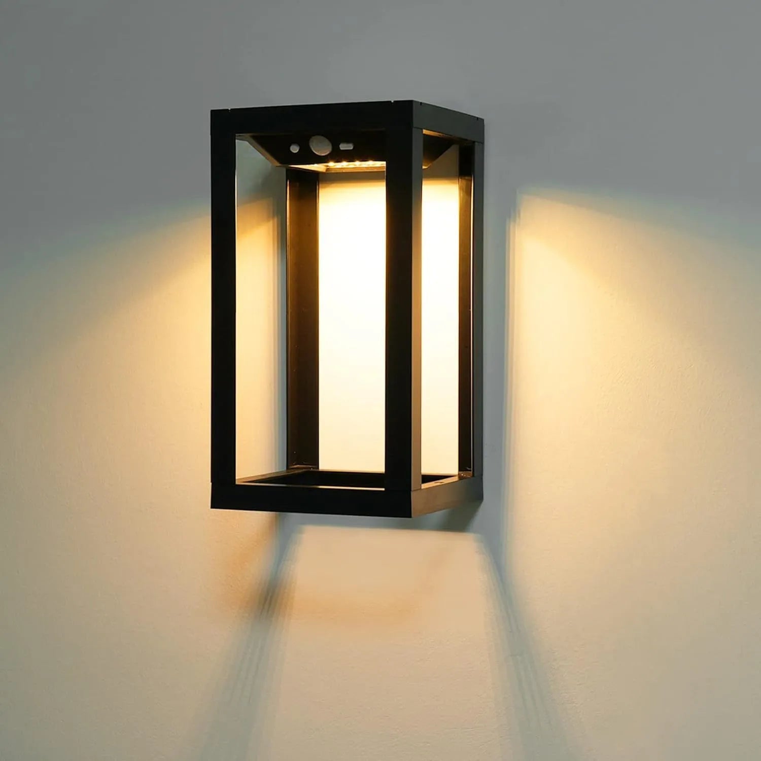 Modern Chinese-style outdoor solar wall lamp with plastic housing for garden and courtyard mounting.