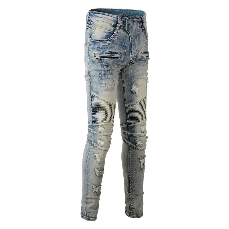 Men's light blue slim fit distressed jeans with hand-frayed details on a mid-waist, straight leg cut.