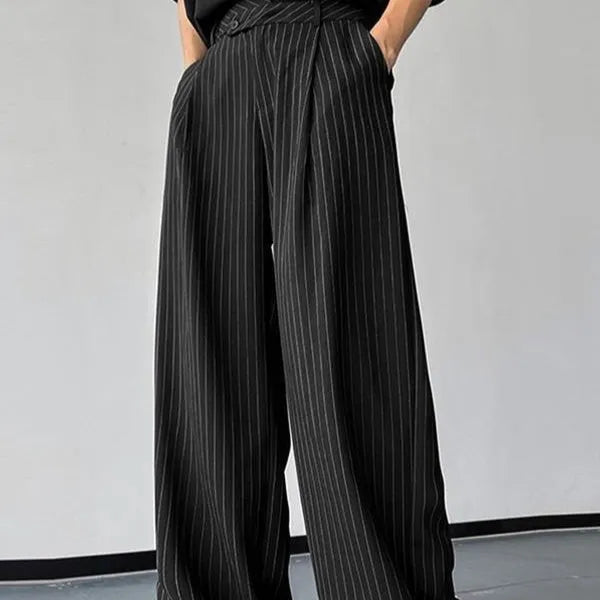 Black men's casual trousers with vertical stripes and pleated design on mannequin
