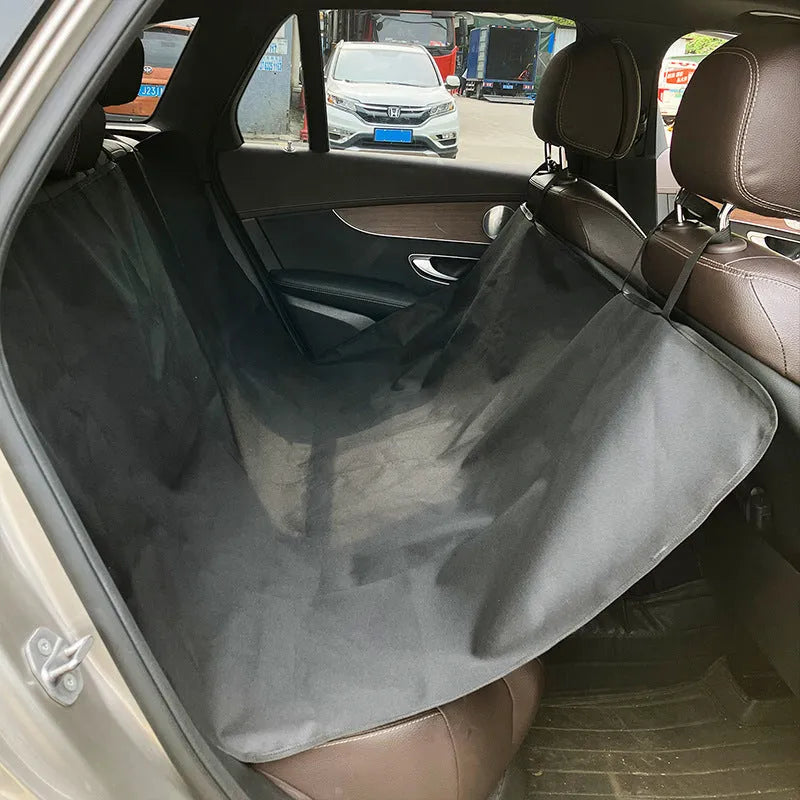 Waterproof cloth car pet mat for rear seat with dog bone print design on a grey background.