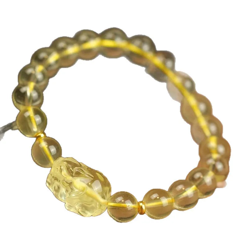 Yellow Pi Xiu bracelet with artificial crystal bead on leather cord, Chinese zodiac design