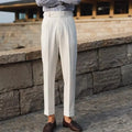 Men's slim fit straight leg formal trousers in apricot, black and white colours.