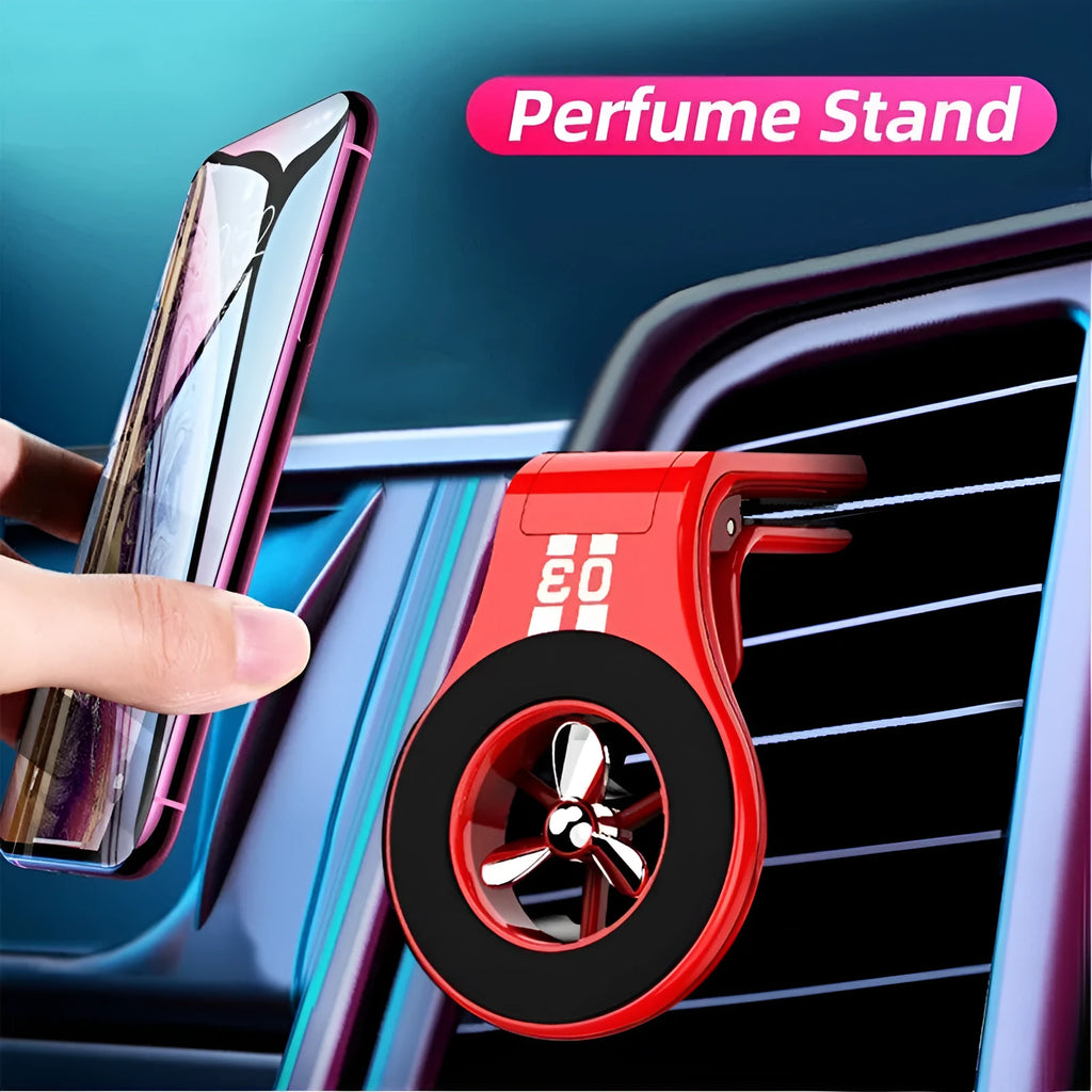 Magnetic car air vent phone holder with perfume dispenser in black, showing phone attached and fragrance slot.