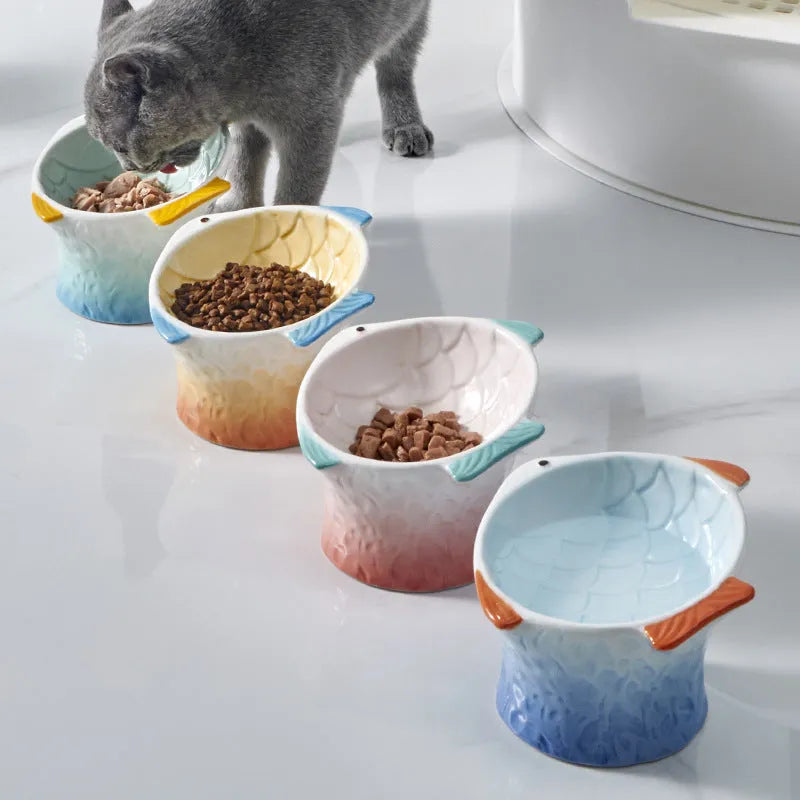 Blue fish-shaped ceramic cat bowl with 15-degree tilt angle and elevated design