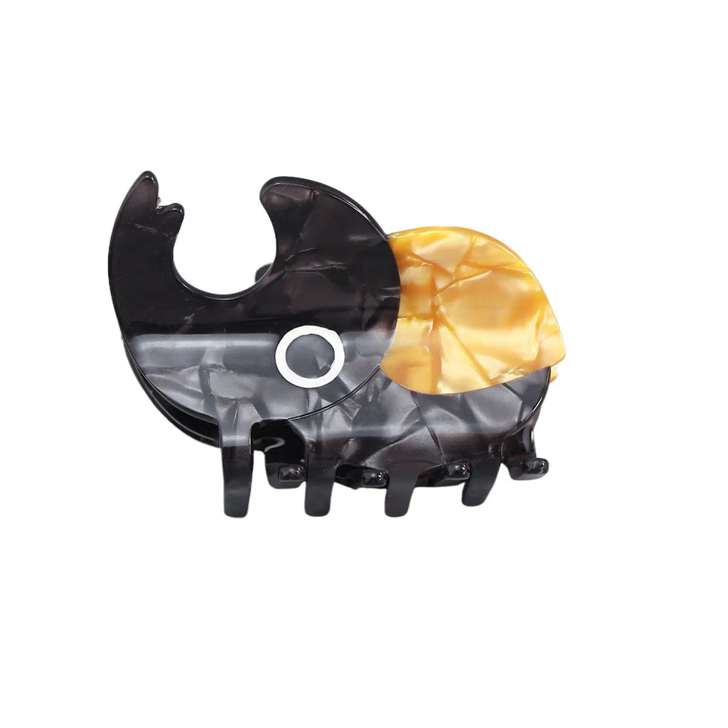 Handmade cellulose acetate hair clip with cartoon beetle design in green or orange colour options