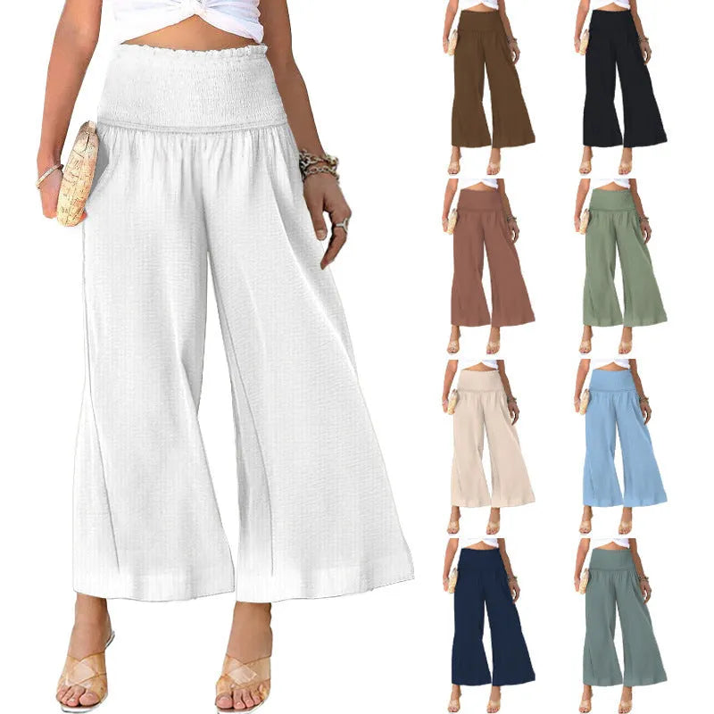Women's high-waist pleated casual trousers in a cotton blend, shown in a cropped straight-leg style.