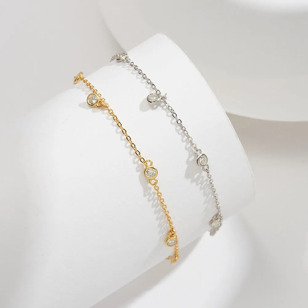 Women's sterling silver anklet with geometric zirconium pendant in gold finish