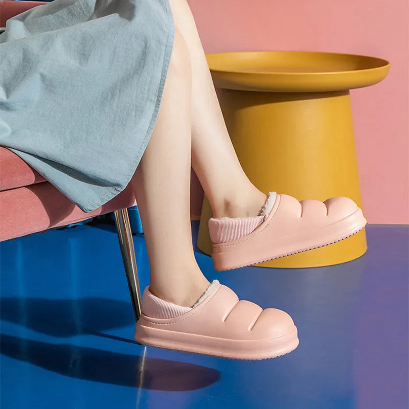 Waterproof couple cotton slippers in EVA material with non-slip sole and plush lining