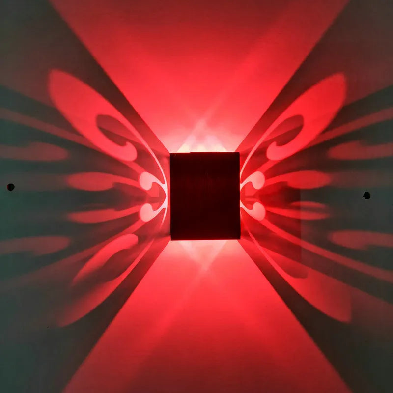 Butterfly-shaped LED wall lamp with aluminium shade in modern style