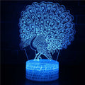 Colourful 3D acrylic USB table lamp with touch control on a wooden desk.