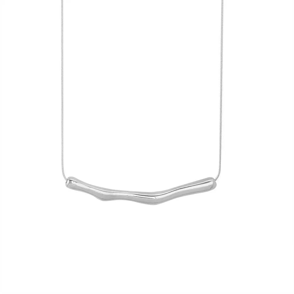 Women's titanium steel necklace with a textured irregular pleated design, shown in gold and steel colour options.