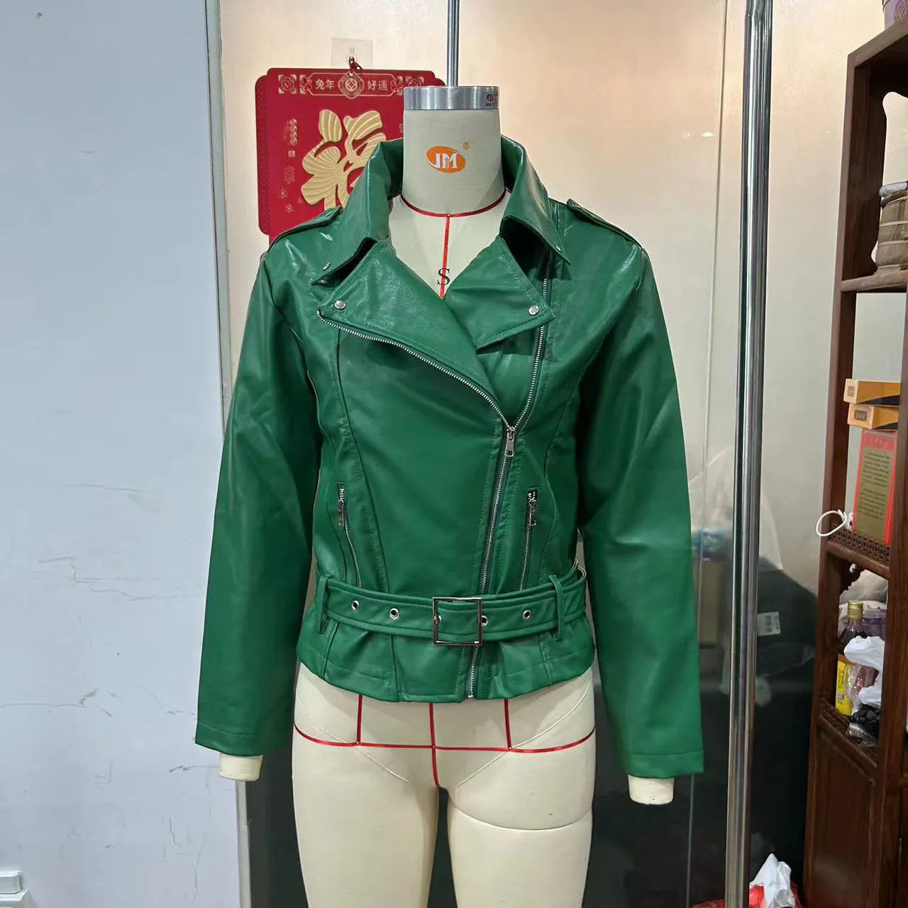 Black punk locomotive style jacket with short belt lapel and Peter Pan collar