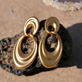 Copper double circle earrings in quicksand colour with a U-shaped French retro silhouette.