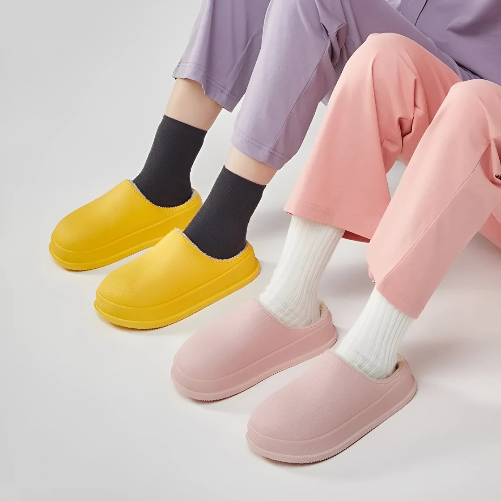 Unisex waterproof non-slip cotton slippers with EVA sole in multiple colours on a floor