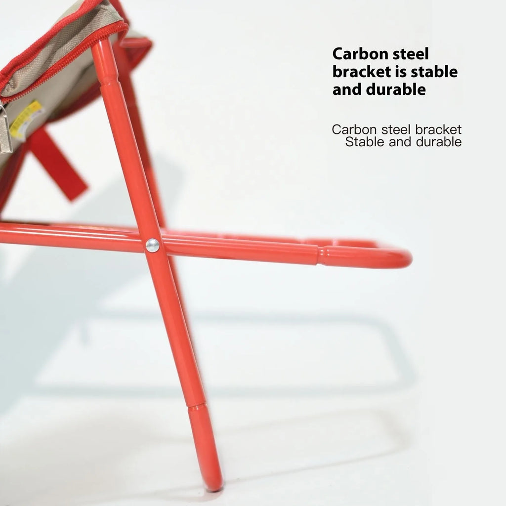 Lightweight foldable camp stool in Oxford cloth, shown in a khaki colour, folded for carrying.