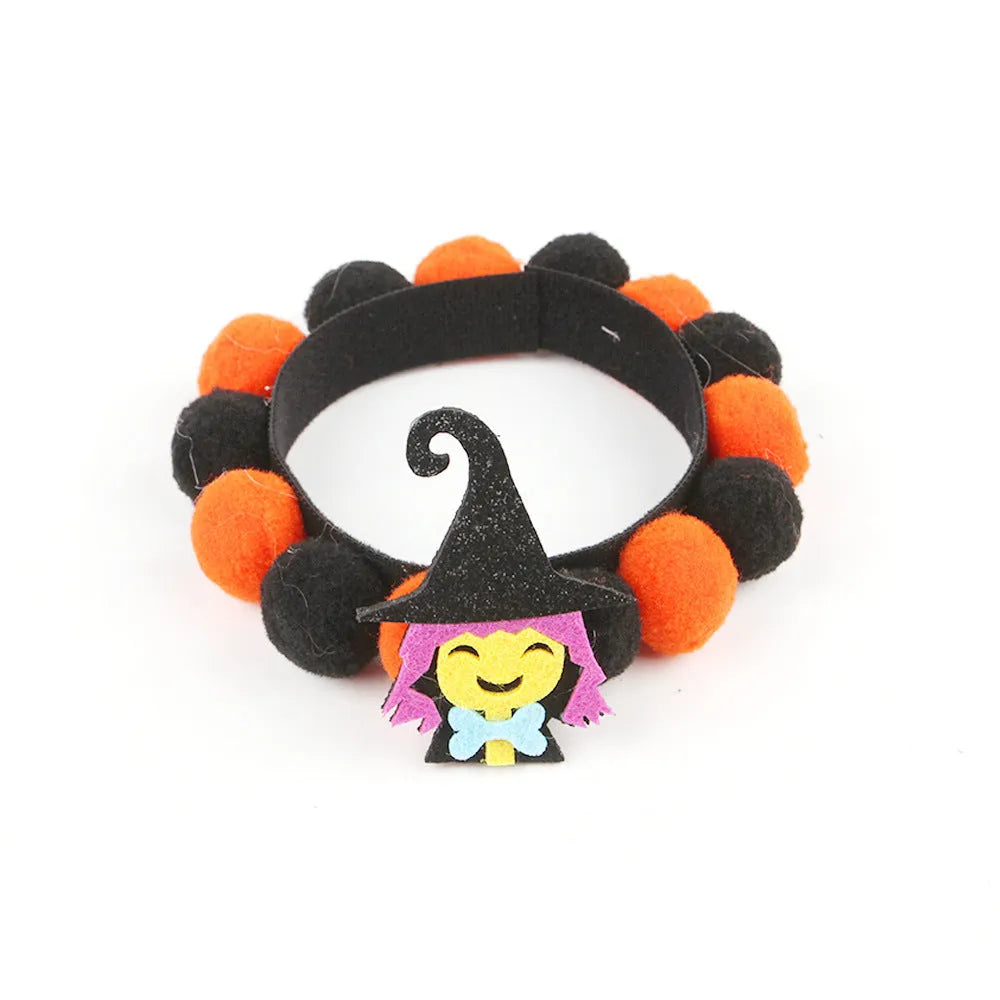 Halloween pet collar with fluffy fur ball accessory in pumpkin design, shown in size M