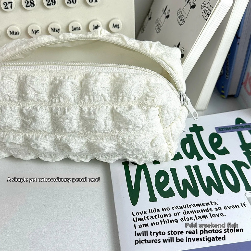 Cream Puff fabric pencil case in beige or black colour for pen and pencil organisation