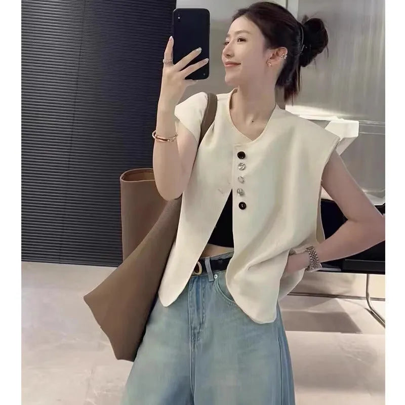 Women's Milky White V-neck polyester vest with side pockets, shown on a model.