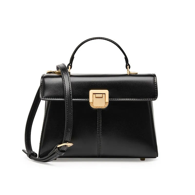 Women's black genuine leather shoulder bag with vachette clasp closure showing horizontal square design