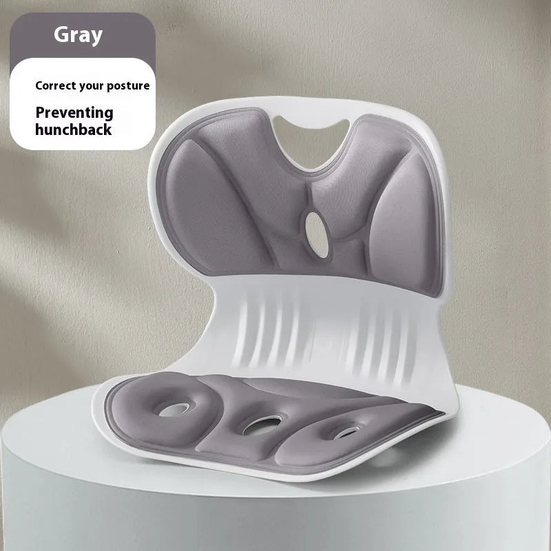 Memory foam backrest cushion with a securing strap shown in a grey colour on a chair.