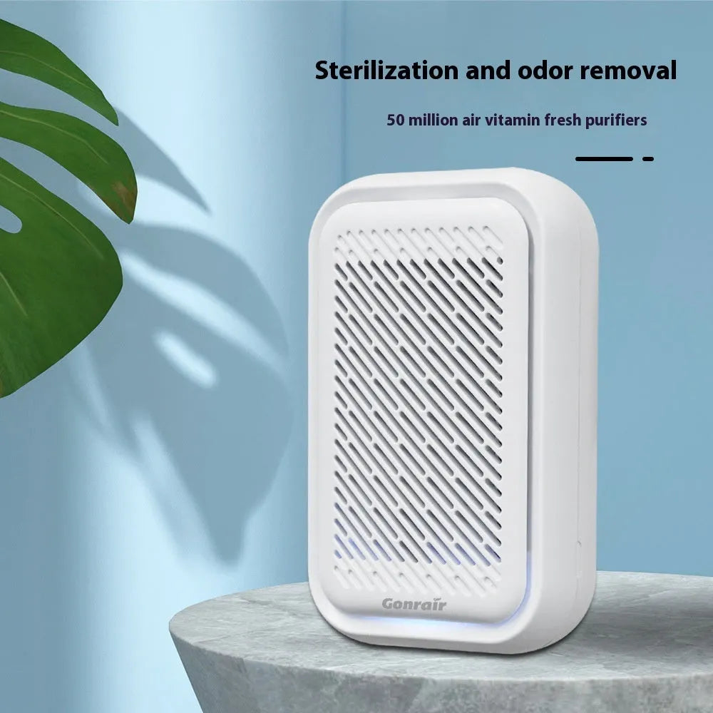 White wall-mounted plug-in air purifier with filter screen for small rooms