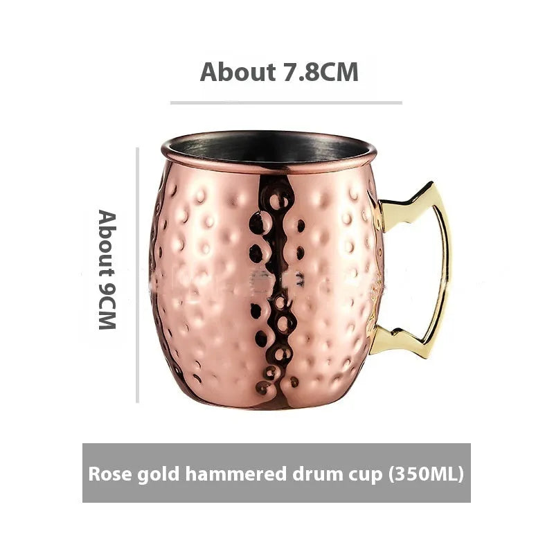Stainless steel Moscow Mule cup with copper plating in hammer point style showing metallic finish.