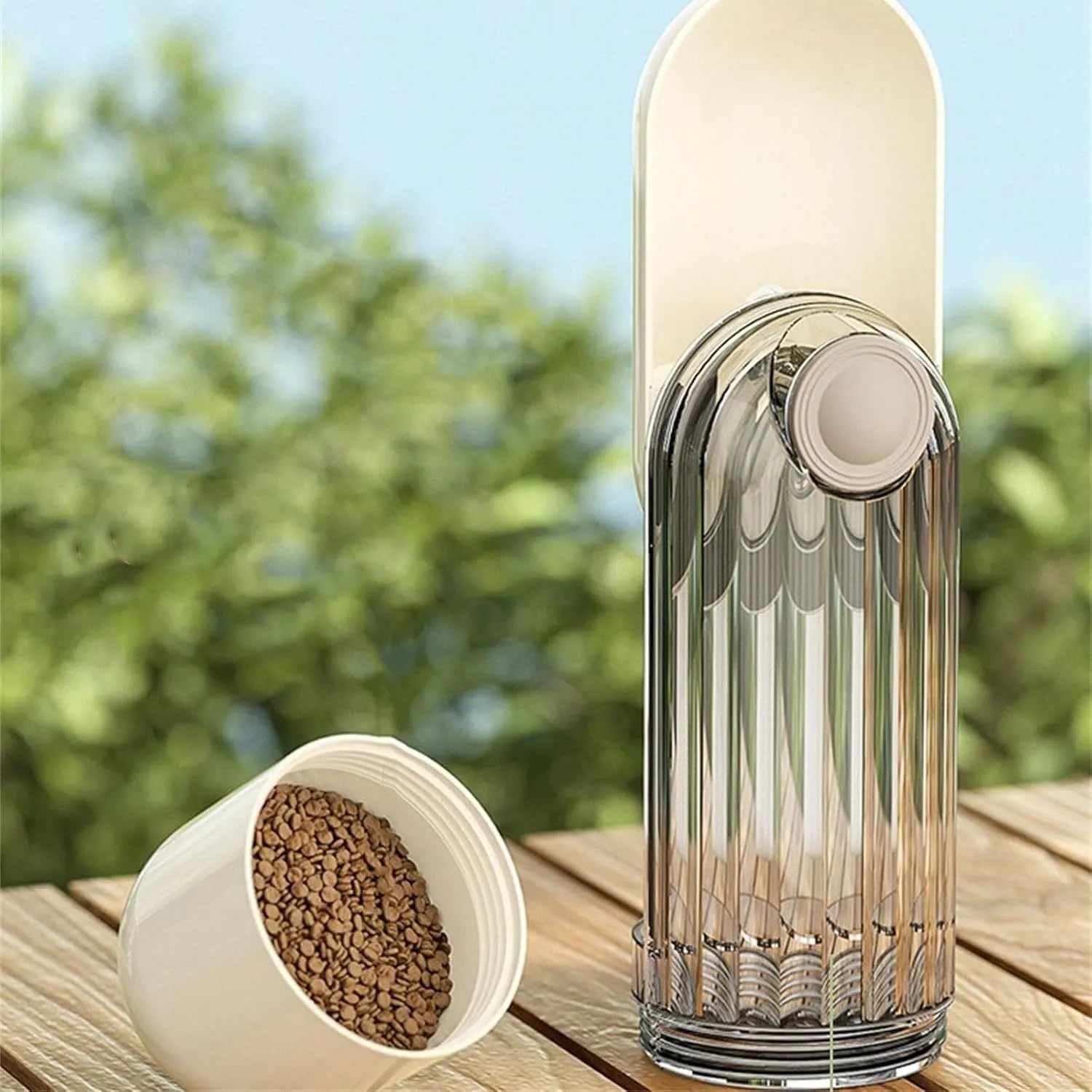Beige foldable dog water bottle with food dispenser base, shown with dimensions.