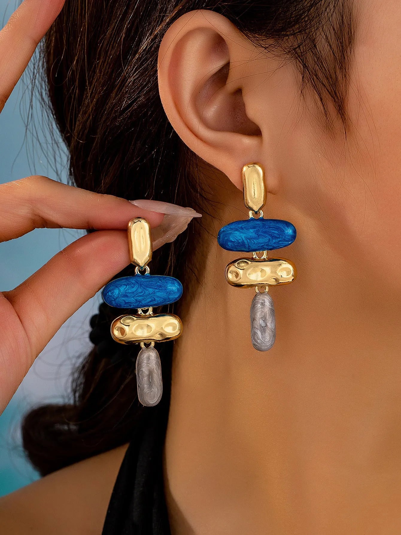 Geometric shaped stud earrings with multicolour electroplated finish on zinc alloy