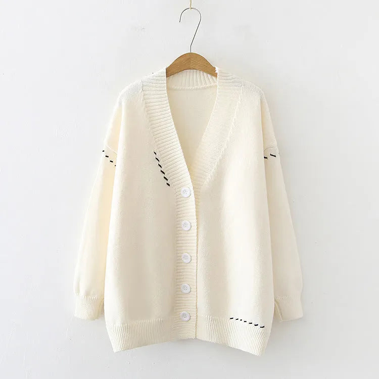 Women's knitted cardigan top coat in black solid colour with long sleeves and loose fit