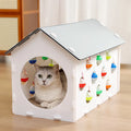 Integrated cat scratch board and nest toy with bell ball tunnel for house cats
