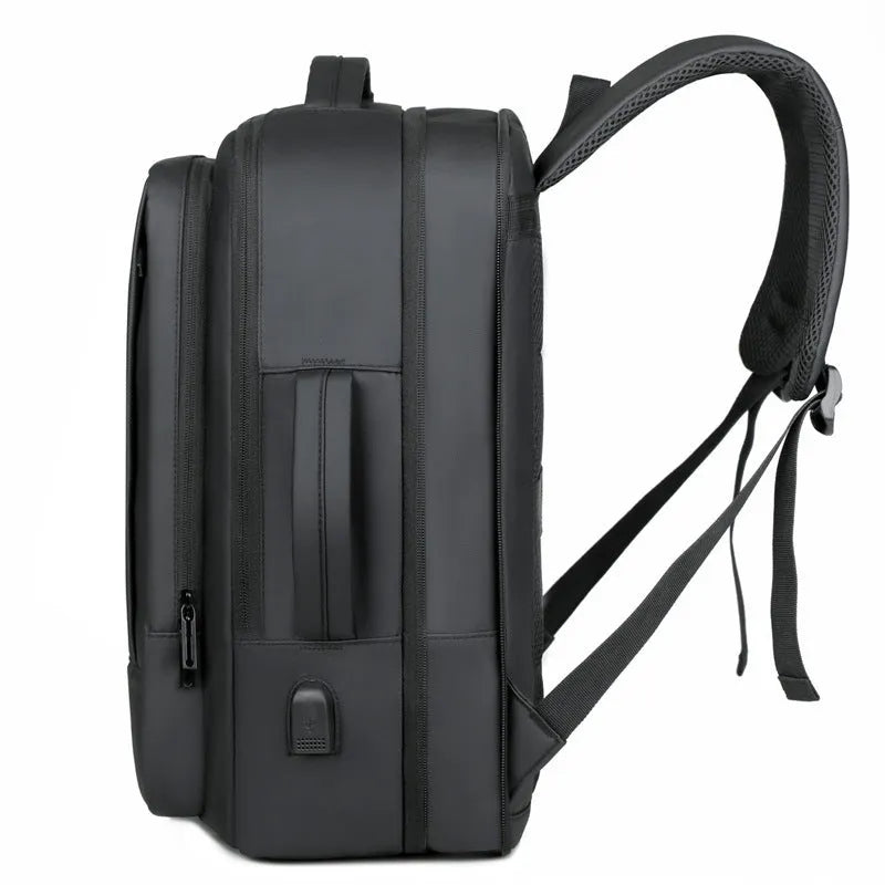 Large black business backpack with curved shoulder strap and waterproof Oxford cloth construction
