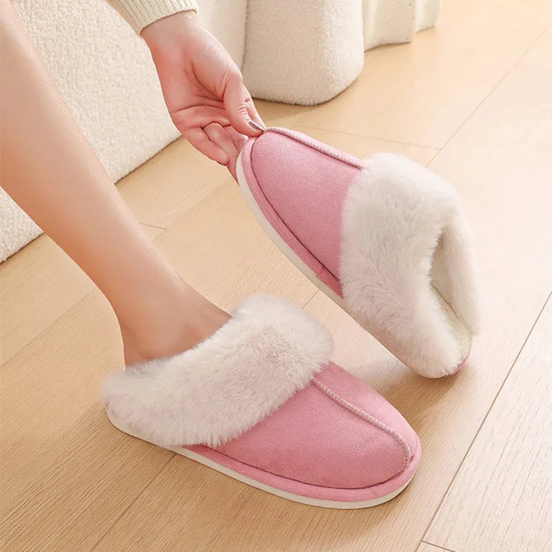 Brown women's plush indoor slippers with round toe, stitching detail, and flat non-slip sole.
