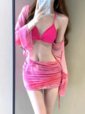 Blue four-piece women's bikini swimsuit set showing shirt, bra, high-waisted briefs, and skirt laid flat.
