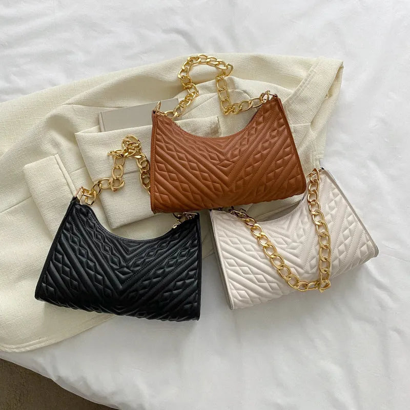 Brown PU leather pleated chain baguette shoulder bag with adjustable strap and soft carry handle